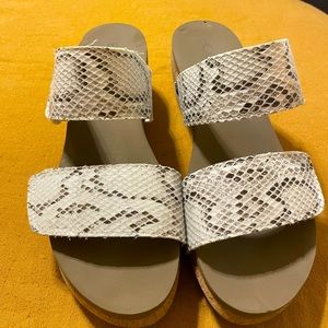 Gently Worn snakeskin wedges. Only wore a handful of times in good condition